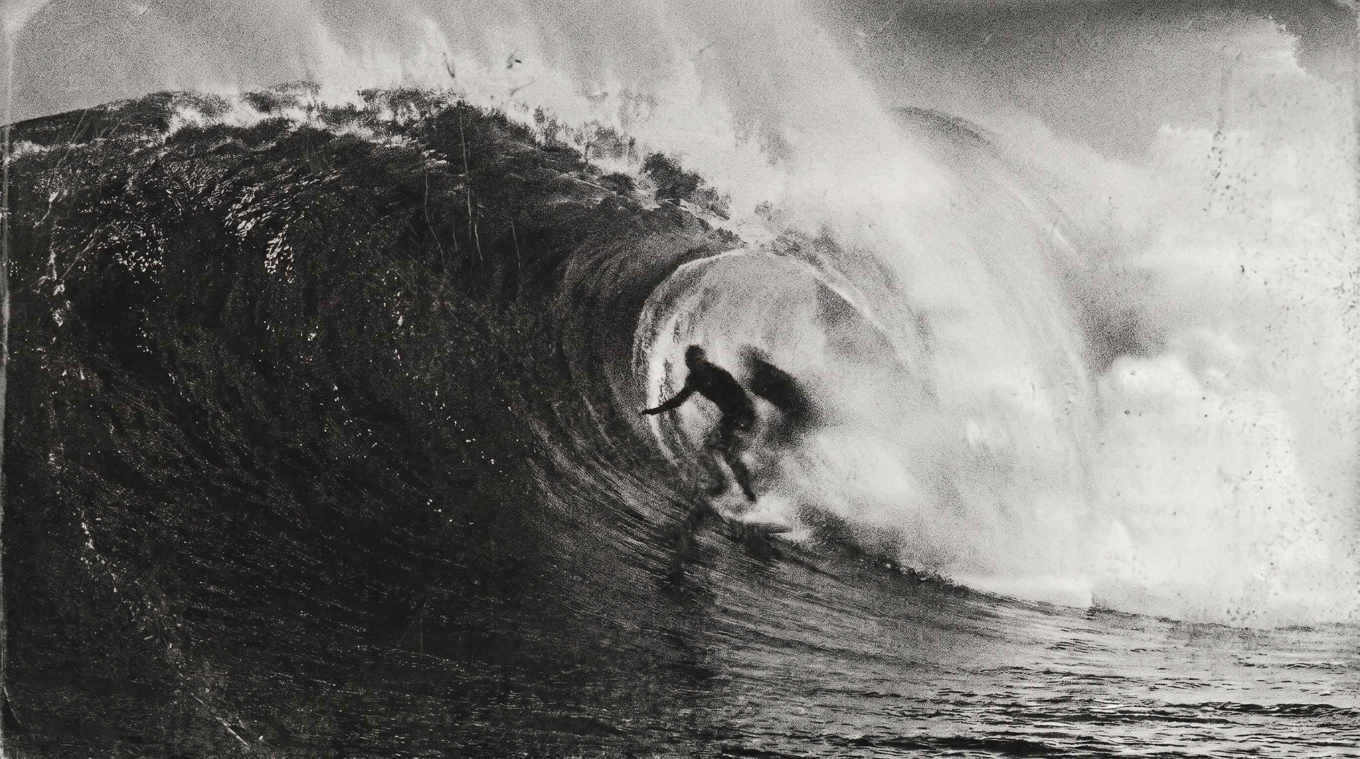 Surfer riding inside a barrel